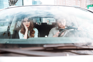 Young couple in car