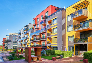 Modern urban complex of residential apartment buildings with benches