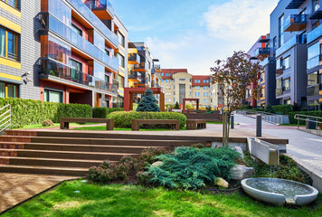 Modern complex of residential apartments buildings with decorative fountain