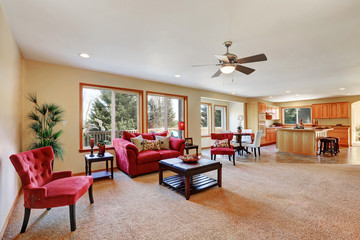 Cozy living room interior with red velvet furniture
