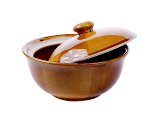 Brown  ceramic bowl isolated on white background
