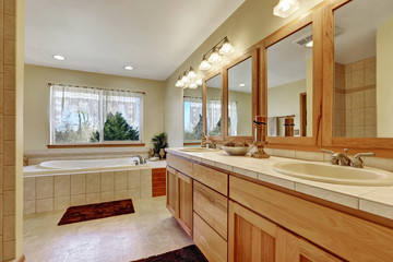 Close up of long double sink bathroom vanity