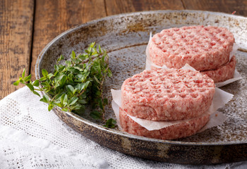 Raw minced meat burgers