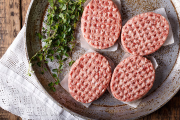 Raw minced meat burgers