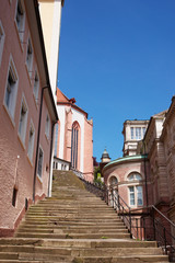 Fototapeta na wymiar Stairs and Baden Baden church Stiftskirche in Germany