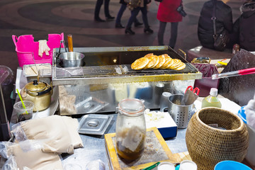 Stall with buns at Myeongdong street market in Seoul