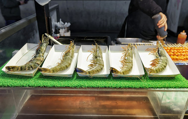 Stall with langoustines at Myeongdong open street market in Seoul