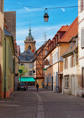 Steeple of Cathedral and street in Colmar in Alsace France