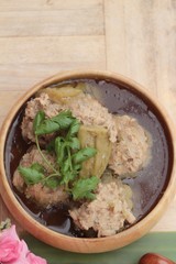 Soup with bitter melon stuffed with minced pork.