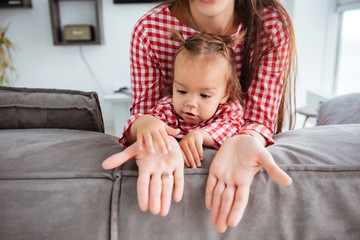 Cropped portrait of daughter with mother