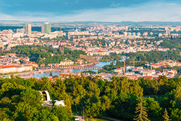 Panorama of the old part of Prague from the Petrin tower. Beautiful view on the bridges over the river Vltava at sunset. Old Town architecture, Czech Republic.