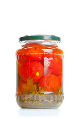 Canned vegetables in glass jars isolated on white background