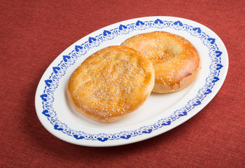 Baked flat bread with sesame