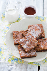  Chocolate Brownie on wooden surface