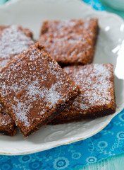  Chocolate Brownie on wooden surface