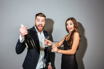 Funny couple with champagne