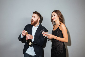 Fashion couple with champagne