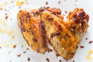 Fried chicken wings on the white plate