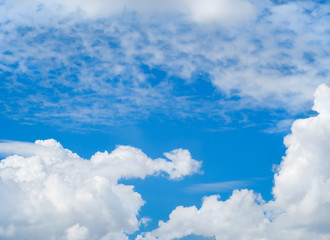 Blue sky and clouds in daylight, used as background 