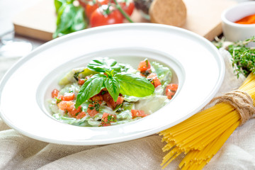 Ravioli pasta from green dough stuffing