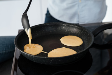 Stove with pancake on pan
