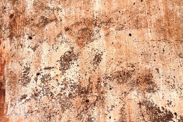 Orange painted ragged wall