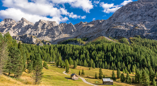Great view of the Val di Fassa valley. National Park Dolomites (Dolomiti), pass Sella. Location famous resort Canazei, Tyrol, Alp, Italy, Europe. Dramatic and picturesque scene. Beauty world.