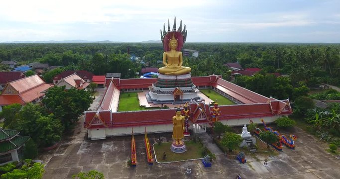 Aerial Shot of Buddha Statue with Nagas Over Head, Songkhla, Thailand