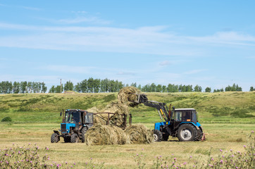 Loading hay front loader