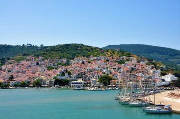 Naklejka premium Skopelos island, Sporades, Greece â€“ June 25, 2016: View of Skopelos from sea