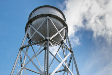 Old Water Tank with Clouds in the background