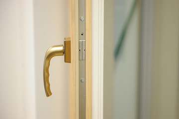 Window handle on wooden window