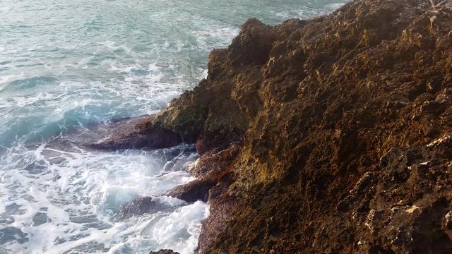 Big Waves Crash into Rocks
