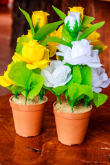 beautiful fake flower on wooden