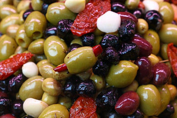 Salad mix of olives in oil close up