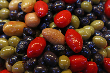 Mix of olives in oil close up