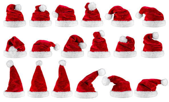 red white christmas santa hats luxury high quality plush row set collection isolated on white background / Weihnachtsm&uuml;tzen Nikolausm&uuml;tzen Reihe Set isoliert