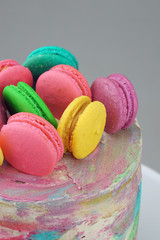 Vanilla Ombre Cake with water colour, buttercream topping with macaroons