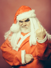 Christmas man showing middle finger