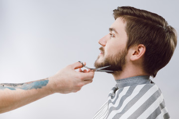Barber doing a beard form