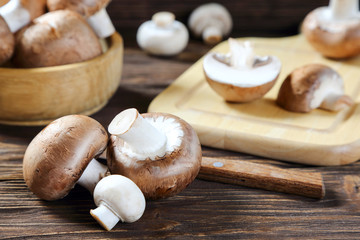 Portobello champignon on a kitchen wooden table