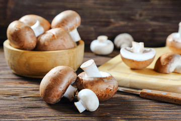 Portobello champignon on a kitchen wooden table