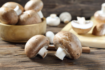 Portobello champignon on a kitchen wooden table