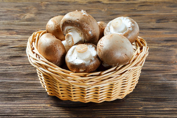 Portobello champignons in a wicker basket