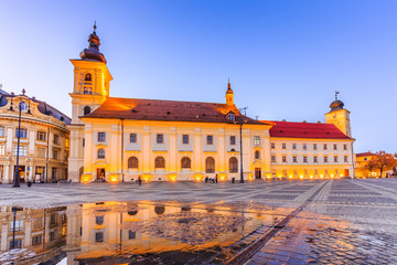 Fototapeta na wymiar Sibiu, Romania. Large Square and City Hall. Transylvania medieval city.