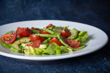 Avocado salad with cherry tomatoes and chia seeds