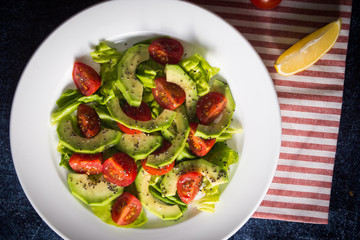 Avocado salad with cherry tomatoes and chia seeds