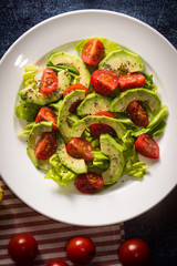 Avocado salad with cherry tomatoes and chia seeds