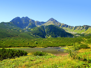 Fototapeta na wymiar Mountain lake Biele pleso in National Park High Tatra. Slovakia, Europe.