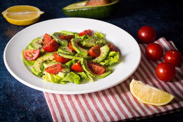 Avocado salad with cherry tomatoes and chia seeds